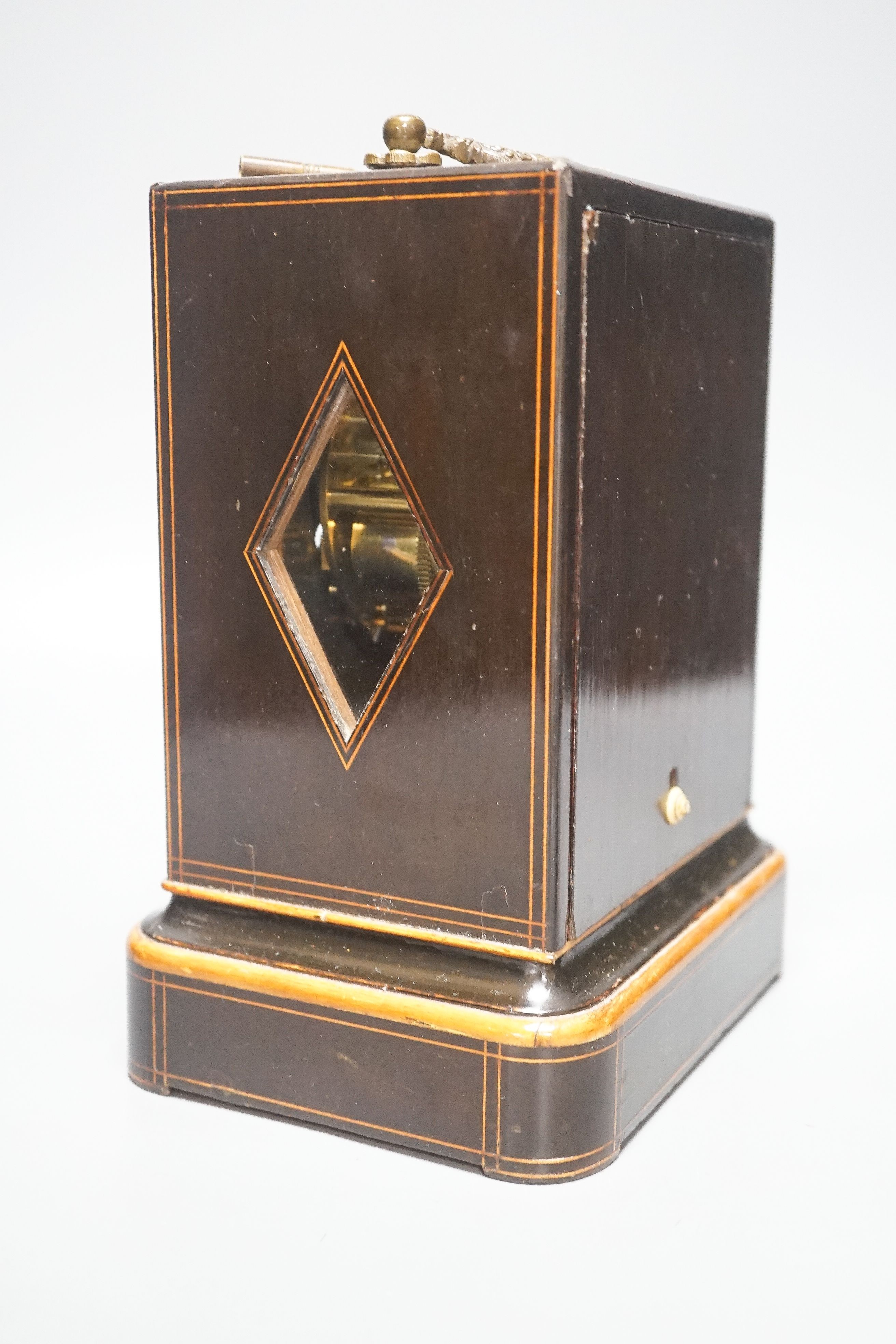 A 19th century French mahogany cased mantel clock, key and pendulum